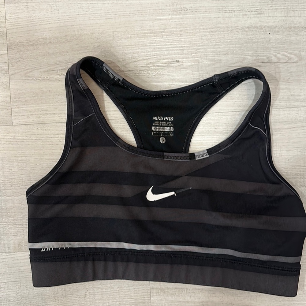 Gray/black striped Nike Sports Bra
